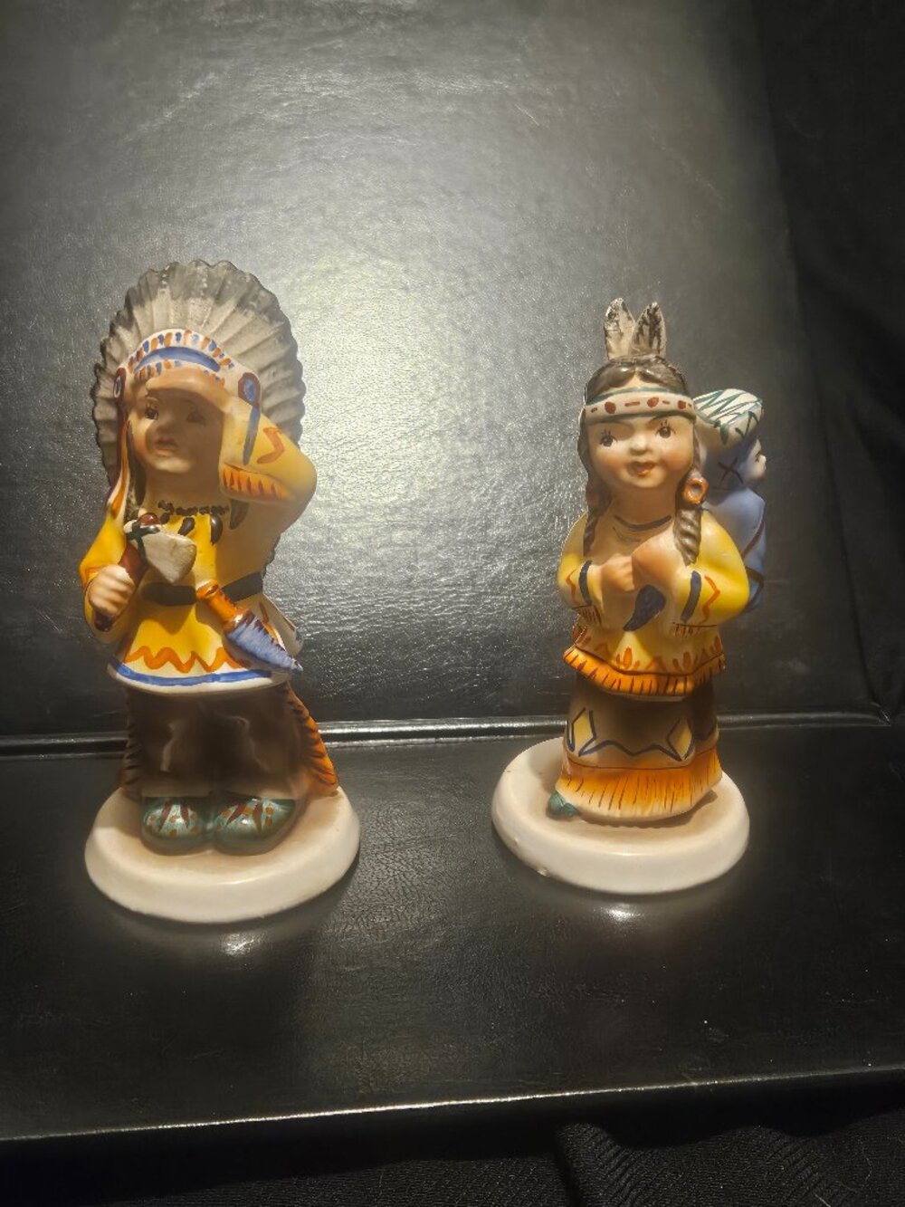 Vintage Man and Woman with Baby Figurines In Indigenous Wear Marked Holland